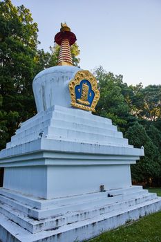 Image of Chorten statue shrine in forest of midwest America