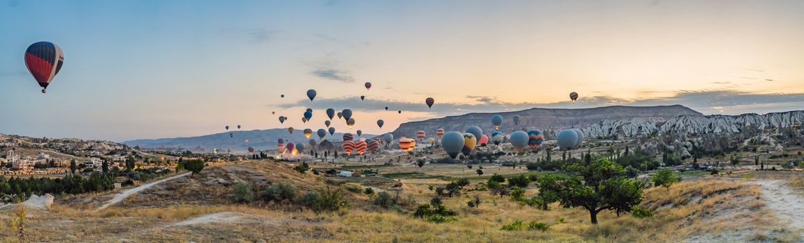 Colorful hot air balloon flying over Cappadocia, Turkey.