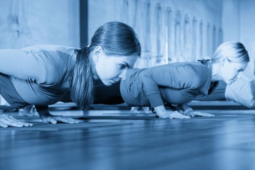 Yoga Class, Group of People Relaxing and Doing Yoga pose