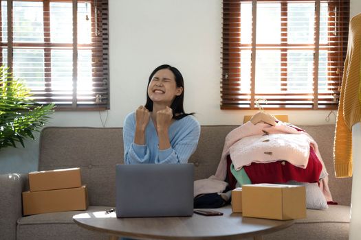 Startup small business entrepreneur SME, asian woman packing box. Portrait of young Asian small business owner in home office, online sell marketing delivery