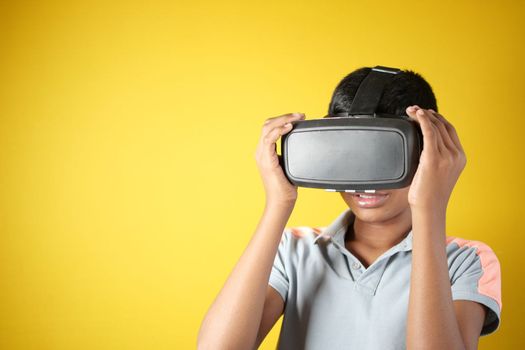  young man wearing virtual reality headset, vr box isolated on white 