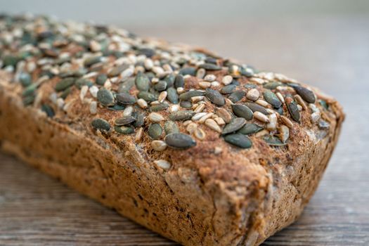 whole grain bread on a wooden table.