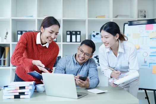 Asian entrepreneurs and business people meeting in a conference room in business planning, financial budget and investment risk assessment to analyze customer groups to increase company growth.