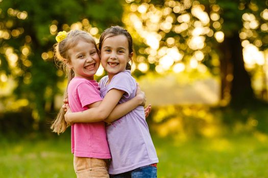 Beautiful little girls enjoying outside.