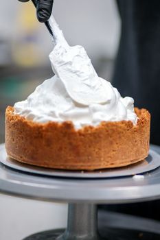 catering chef preparing key lime pie in pro kitchen