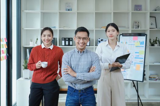 Asian entrepreneurs and business people meeting in a conference room in business planning, financial budget and investment risk assessment to analyze customer groups to increase company growth.