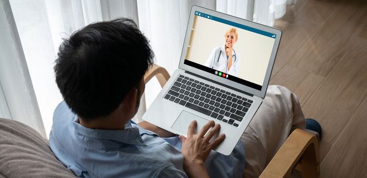 Doctor video call online by modish telemedicine software application for virtual meeting with patient