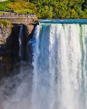 Image of Canada looking at American Falls in detail with tourist overlook tiny in comparison