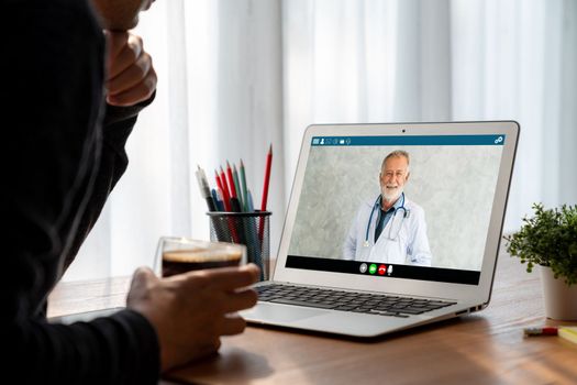 Doctor video call online by modish telemedicine software application for virtual meeting with patient