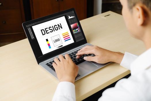 Graphic designer software for modern design of web page and commercial ads showing on the computer screen