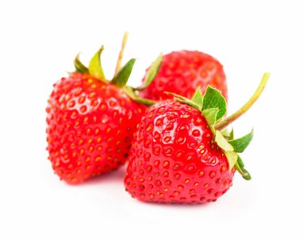 Closeup shot of fresh strawberries. Isolated on white background.