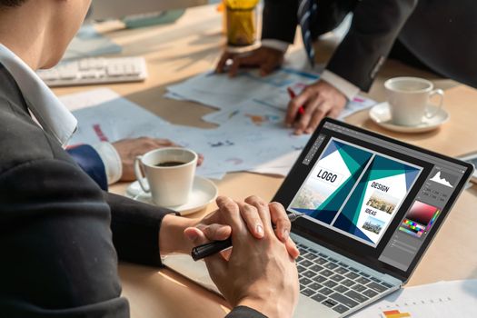 Graphic designer software for modern design of web page and commercial ads showing on the computer screen