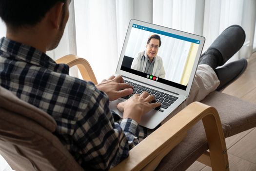 Doctor video call online by modish telemedicine software application for virtual meeting with patient
