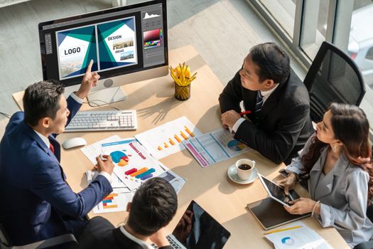 Graphic designer software for modern design of web page and commercial ads showing on the computer screen