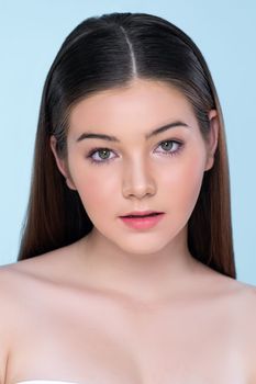 Natural beauty closeup portrait of young charming brunette girl looking at camera. Perfect smooth face skin attractive young girl with bare shoulder for skincare and cosmetic product.