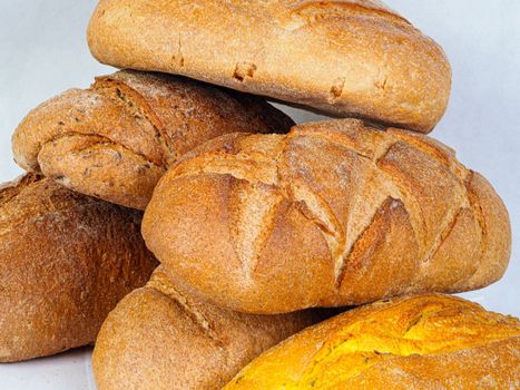 assortment of table bread on white background