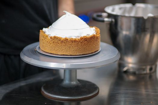 catering chef preparing key lime pie in pro kitchen