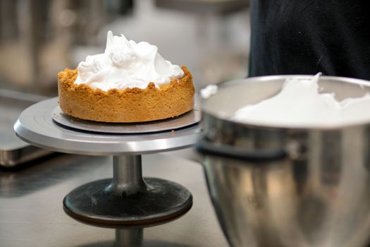 catering chef preparing key lime pie in pro kitchen