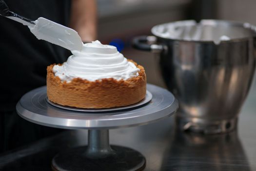 catering chef preparing key lime pie in pro kitchen