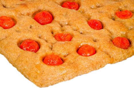 Italian flat bread organic wholewheat focaccia with tomatoes isolated in studio over a background