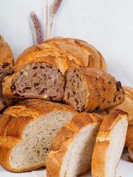assortment of bread on white background
