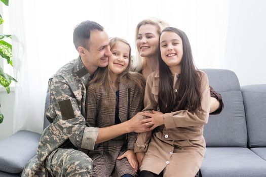 Soldier On Leave Hugging Daughter.