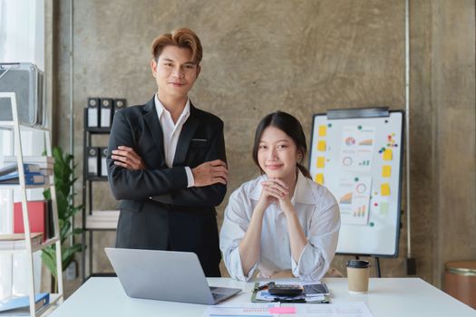 Asian business advisor meeting to discuss and analyze and the situation on the financial report in the meeting room. Fund Investment and accounting concept