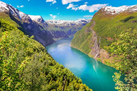 Peaceful Geirangerfjord with boat and waterfall, Norway , Nordic Countries