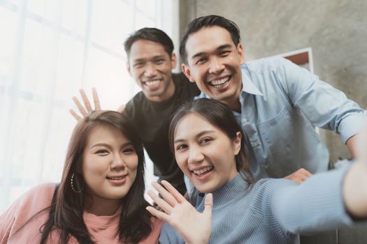 Excited friends having fun by watching football or soccer match and eating pizza at home. Friendship, leisure, rest, home party football, Soccer concept.