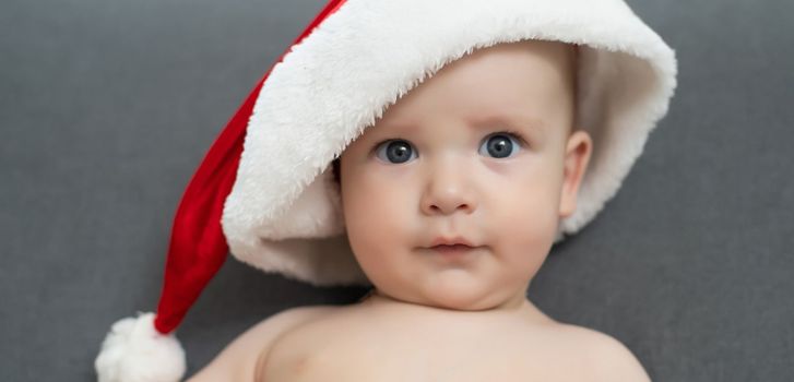 Christmas little baby boy, baby in santa hat