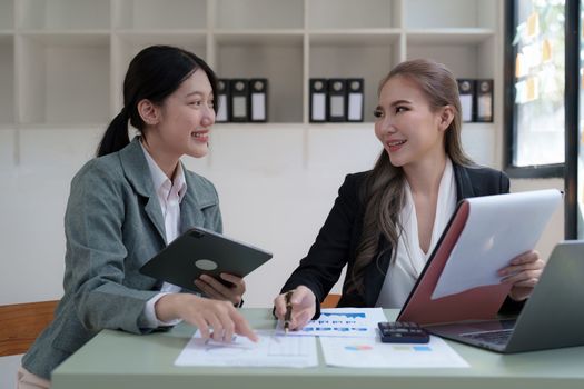Group of business consultant working management big data and analyze financial document of company.