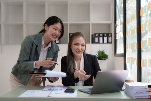 Group of business consultant working management big data and analyze financial document of company.