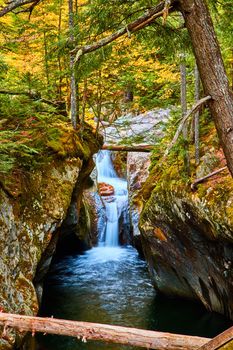 Image of Fall narrow gorge in Vermont with stunning waterfall raging through