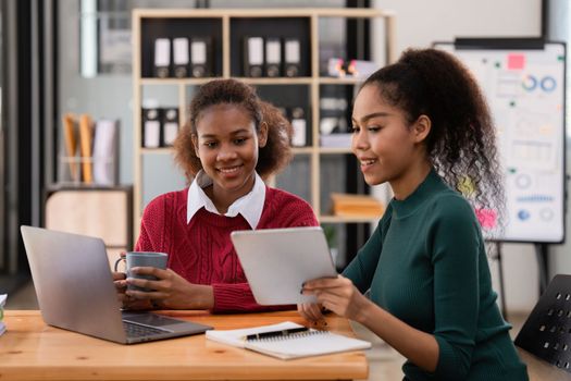 Two Black Business women at casual meeting room discussing and brainstorm idea about marketing. Business consult concept.