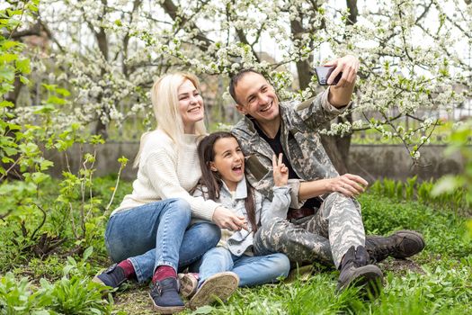 Soldier reunited with his family in park