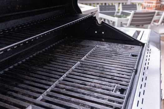 Clean six-burner gas grill ready for summer grilling.