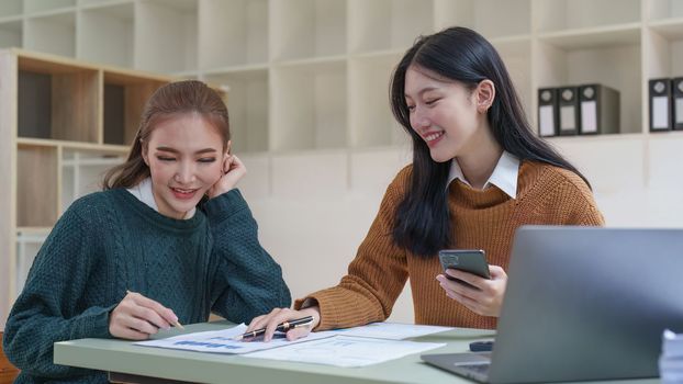Asian business advisor meeting to discuss and analyze and the situation on the financial report in the meeting room. Fund Investment and accounting concept.