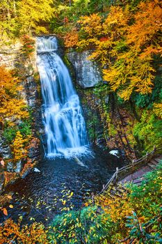 Image of Boardwalk overlooks magical waterfall tucked into peak fall forests of Pennsylvania