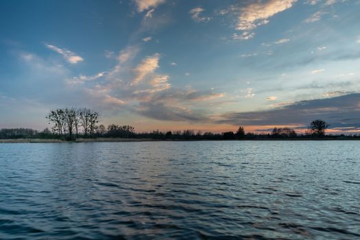 Sunset over a quiet lake, Stankow, Poland