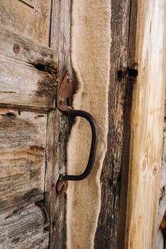 wooden barn door with handle. old wooden buildin