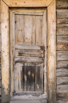 wooden barn door with handle. old wooden buildin