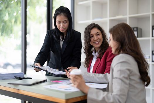 business adviser meeting to analyze and discuss the situation on the financial report in the meeting room.Investment Consultant, Financial advisor and accounting concept.