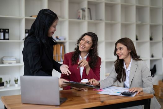 business adviser meeting to analyze and discuss the situation on the financial report in the meeting room.Investment Consultant, Financial advisor and accounting concept.