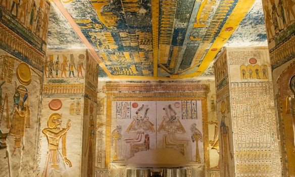 Hieroglypic carvings on columns and wall in the ancient egyptian tomb of ramses 5 and 6 at Luxor Valley of the Kings
