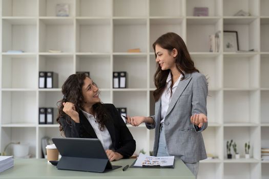 business adviser meeting to analyze and discuss the situation on the financial report in the meeting room.Investment Consultant, Financial advisor and accounting concept.