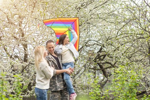 Soldier reunited with his family in park