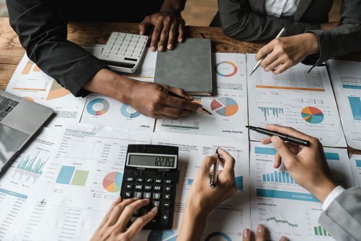 Startup business meeting to analyze and discuss the situation on the financial report in the meeting room. Investment Consultant, Financial advisor and accounting concept.