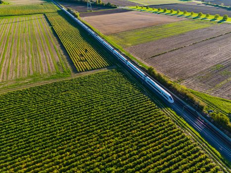 Aerial view of an ICE on a railway track in rural area, Germany