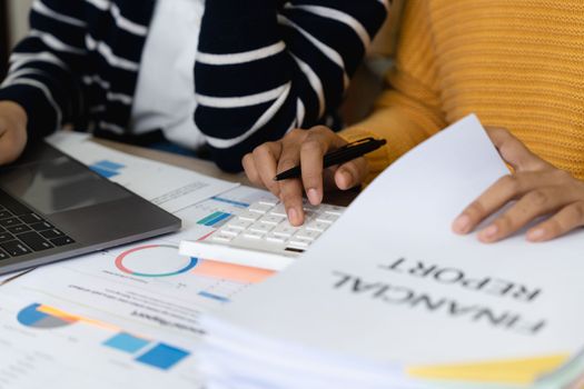 business adviser meeting to analyze and discuss the situation on the financial report in the meeting room.Investment Consultant, Financial advisor and accounting concept.