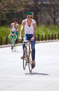 Hes got mad style. urban cyclists out for a ride in the city streets